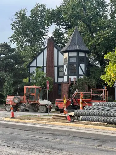 Tudor turret watches over street work.